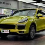 Orange Porsche Cayenne