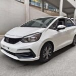 Vibrant Red Honda Fit: 2023 Chinese Car EV Contemporary
