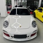 Yellow Porsche 718 Cayman 2010: Amid China Crackdown (53 chars)